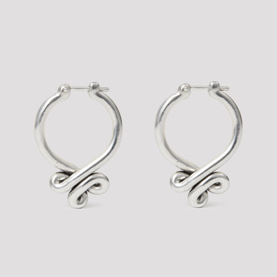 Silver hoops with a three curl knot at the botom. 